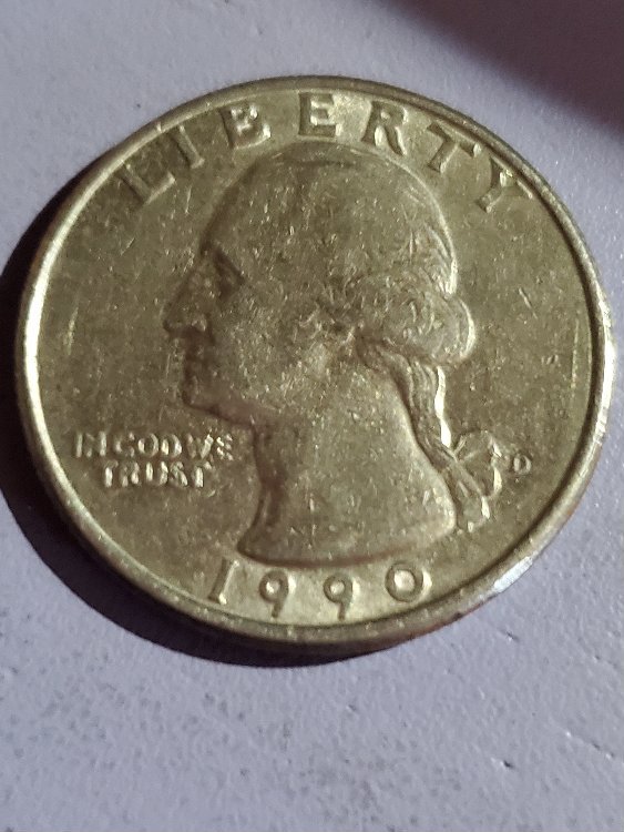 1990-D-Quarter-What-Is-This-Wrapped-Around-The-Stem-Of-The-Leaves?